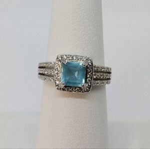 Elegant Blue and Silver Topaz Ring with Diamond Accents